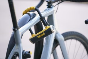 Bike secured to metal bike stand with an OnGuard D Shackle style lock